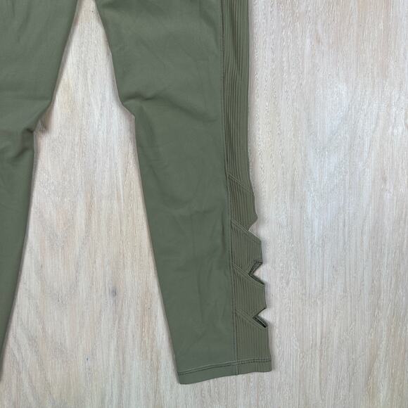 Athleta Salutation Stash Pocket II Laser Cut 7/8 Tight Olive Green Leggings XS - Picture 4 of 16